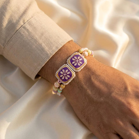 Purple Floral Twin Motif Pearl Rakhi with Pastel Bead Tassels