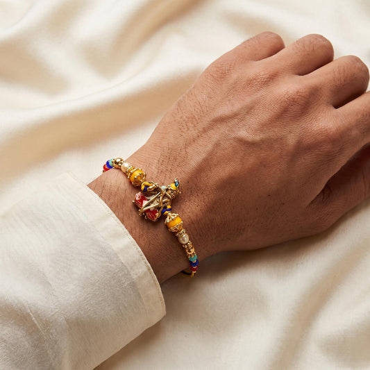 Divine Lord Krishna Flute Rakhi with Gold & Multicolor Beads
