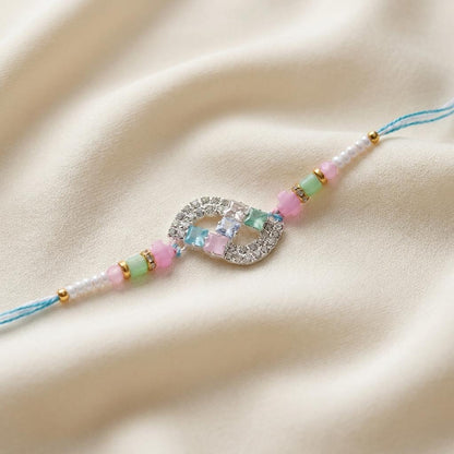 Elegant CZ Infinity Designer Rakhi with Pastel Beads for Brother