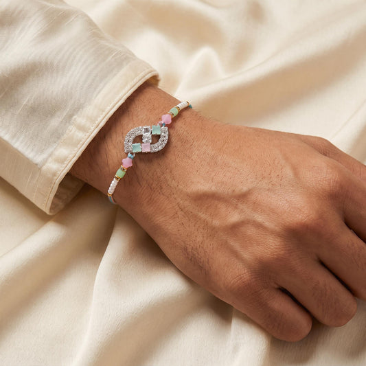 Elegant CZ Infinity Designer Rakhi with Pastel Beads for Brother