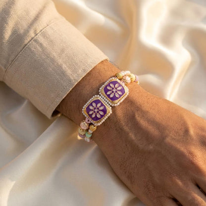 Purple Floral Twin Motif Pearl Rakhi with Pastel Bead Tassels