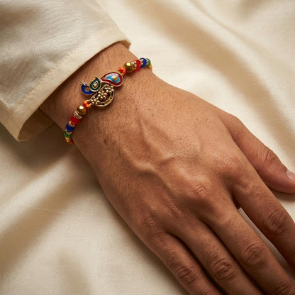 Premium Handcrafted Peacock Motif Rakhi with Colorful Beads