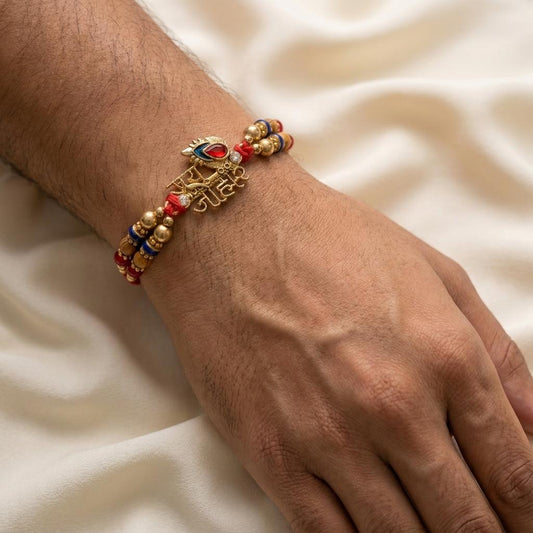 Ethnic 'Jai Johar' Gold-Tone Rakhi with Red & Blue