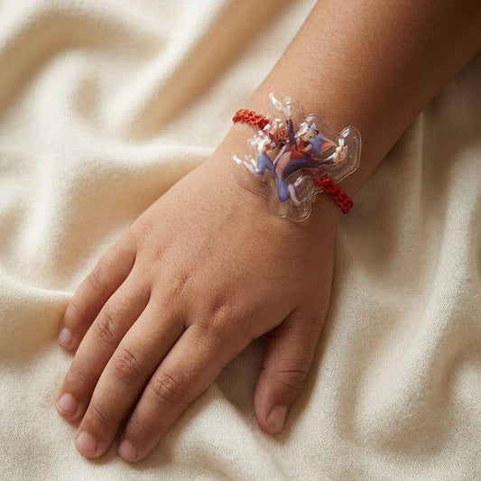 Playful Cartoon Kid's Dhamal Rakhi with Red Braided Thread
