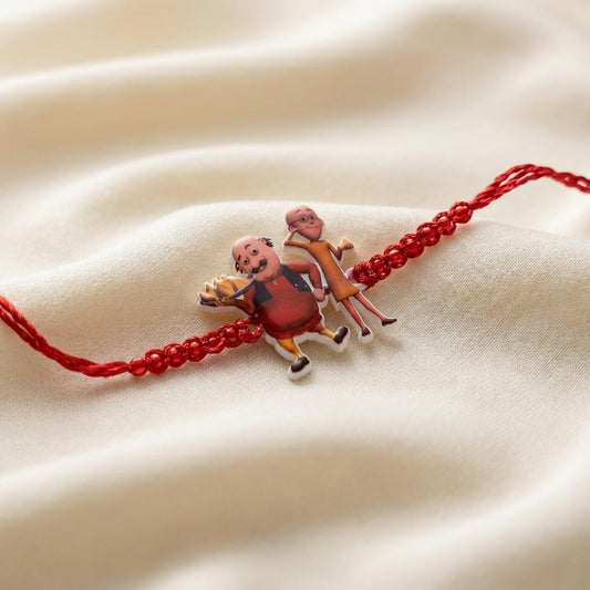 Playful Motu Patlu Rakhi for Kids with Red Braided Thread