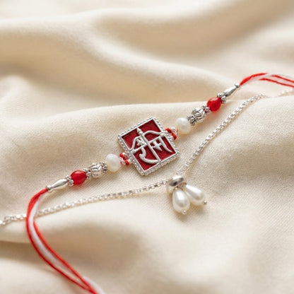Silver 'Ram' Script Couple Rakhi Set with Pearl Drop Bracelet