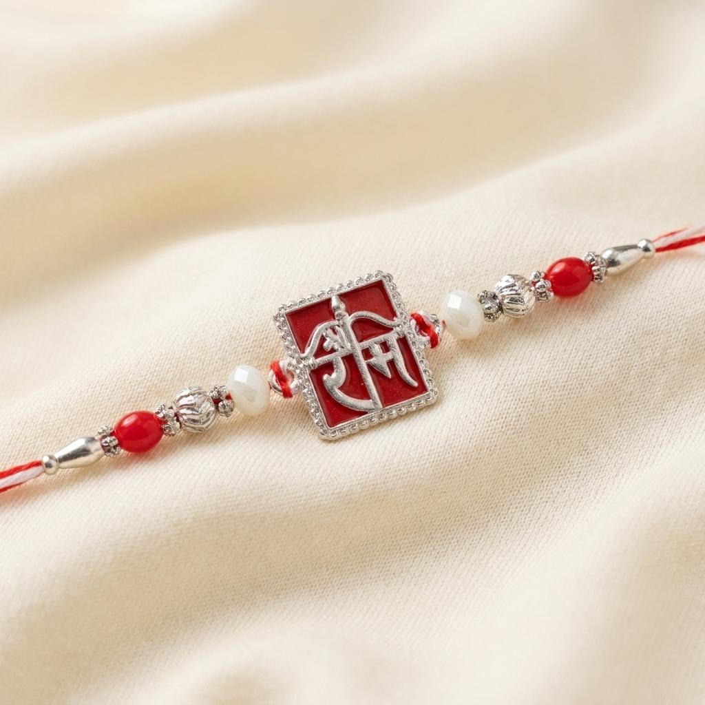 Silver 'Ram' Script Couple Rakhi Set with Pearl Drop Bracelet