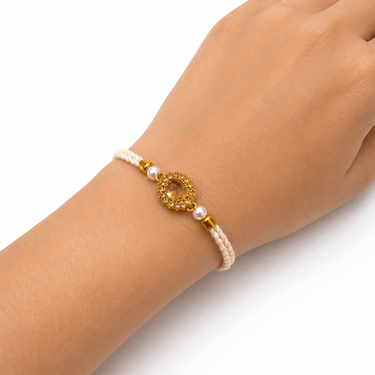 Elegant Crystal Halo Rakhi with Pearls & Braided Cord - selfie to print