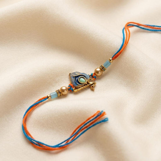 Elegant Krishna Bansuri & Mor Pankh Rakhi with Blue Beads - selfie to print