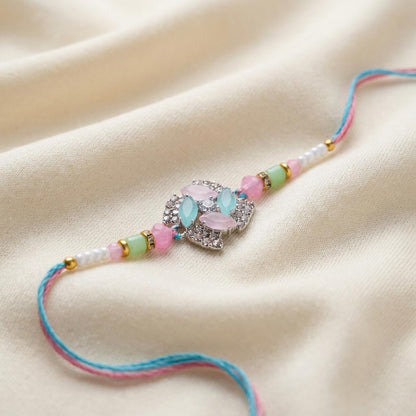 Elegant Pastel Gemstone Rakhi with Silver-Tone Rhinestones - selfie to print