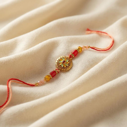Gold Floral Enamel Medallion & Red Bead Rakhi - selfie to print
