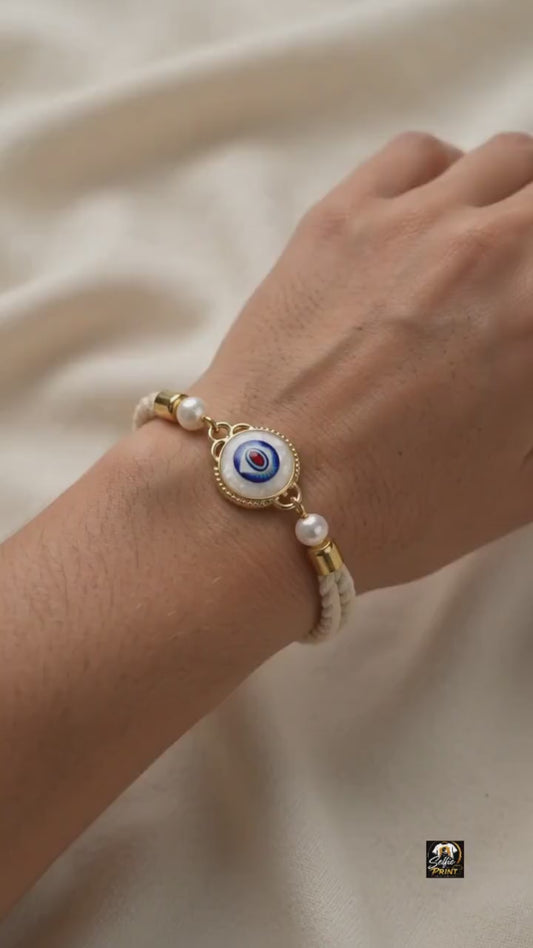 Handmade Evil Eye Stone Rakhi with Pearl & Gold Filigree