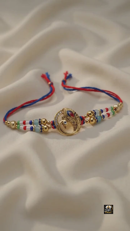 Majestic Peacock Feather Gold Rakhi with Multicolor Beads & Thread