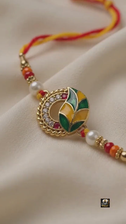 Sacred Yellow Red Thread Rakhi with Green Enamel & Pearl