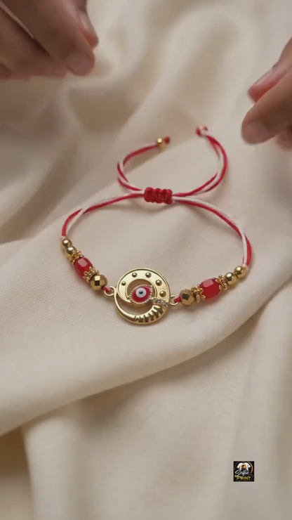 Handcrafted Evil Eye Rakhi with Red & Gold Beaded Thread