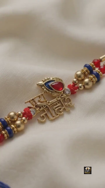 Ethnic 'Jai Johar' Gold-Tone Rakhi with Red & Blue
