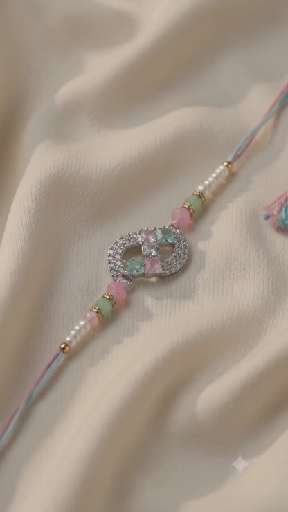 Elegant CZ Infinity Designer Rakhi with Pastel Beads for Brother